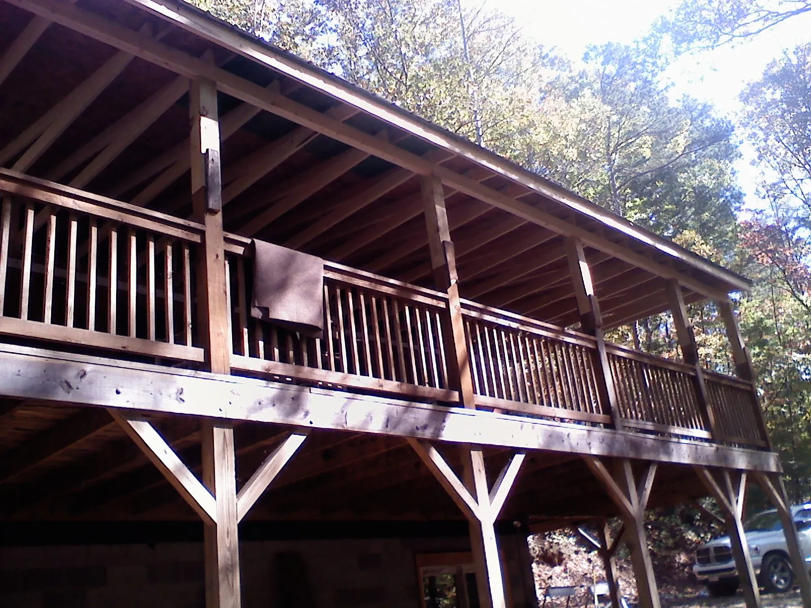 Timber framing under a new elevated porch and deck — Roof Leak Repair in West Middletown by Roofing Brothers